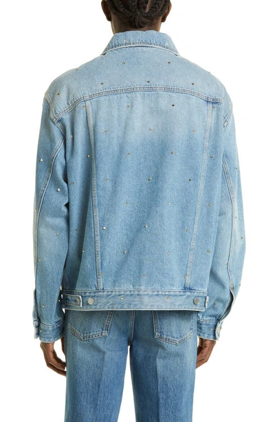 Shop Valentino Garavani Roman Stud Embellished Denim Jacket In 558-medium Blue Denim