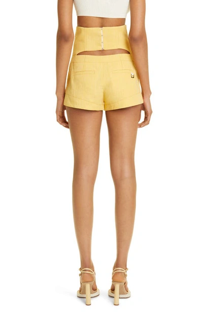 Shop Jacquemus Areia High Waist Cutout Linen Blend Shorts In Yellow