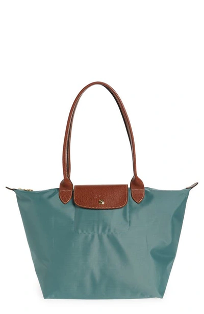 Shop Longchamp Large Le Pliage Tote In Cypress