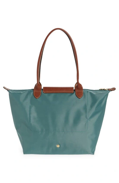 Shop Longchamp Large Le Pliage Tote In Cypress