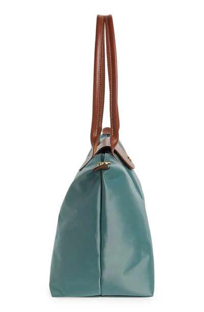 Shop Longchamp Large Le Pliage Tote In Cypress