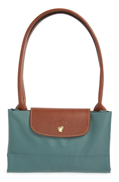 Shop Longchamp Large Le Pliage Tote In Cypress