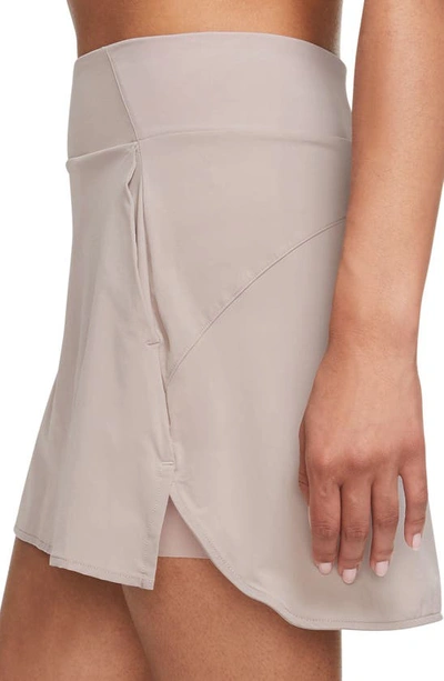 Shop Nike Dri-fit Bliss Training Skort In Diffused Taupe/ Clear