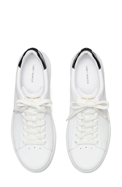 Shop Tory Burch Howell Court Sneaker In Titanium White / Perfect Black