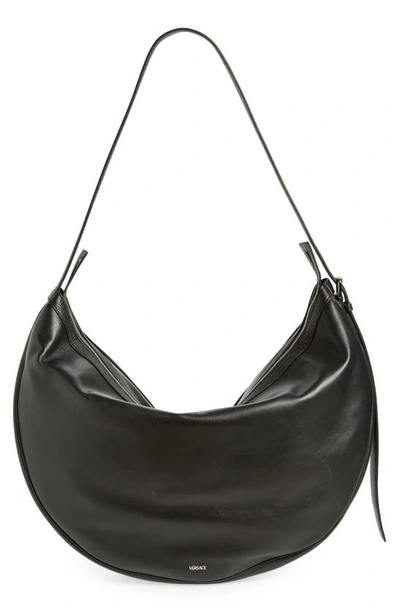 Shop Versace Medium Repeat Leather Hobo Bag In Black/ Palladium