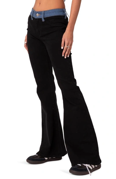 Shop Edikted Contrast Waist Flare Leg Jeans In Black