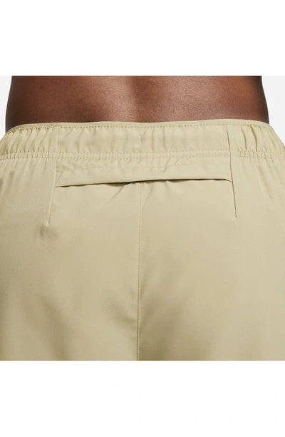 Shop Nike Dri-fit Challenger Athletic Shorts In Neutral Olive/ Black