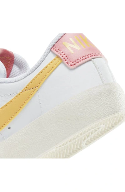 Shop Nike Kids' Blazer Low '77 Low Top Sneaker In White/ Sail/ Orange/ Gold