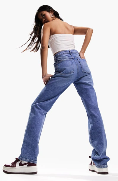 Shop Asos Design Slim Straight Leg Jeans In Medium Blue