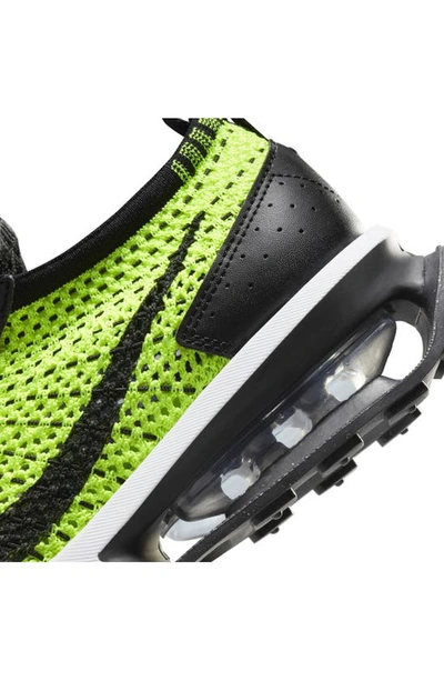 Shop Nike Air Max Flyknit Racer Sneaker In Volt/ White/ Sequoia/ Black