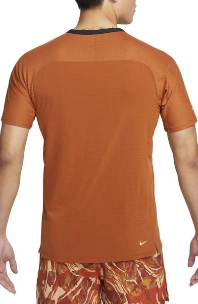 Shop Nike Dri-fit Trail Solar Chase Performance T-shirt In Dark Russet/ Bright Mandarin