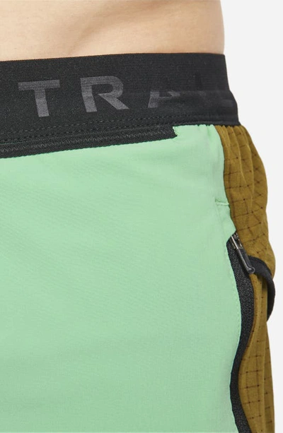 Shop Nike Dri-fit Trail Running Shorts In Green/ Olive/ White