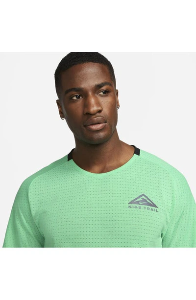Shop Nike Dri-fit Trail Solar Chase Performance T-shirt In Spring Green/ Gridiron
