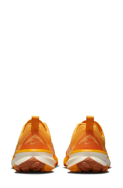 Shop Nike React Terra Kiger 9 Running Shoe In Melon/ Sundial/ Mandarin