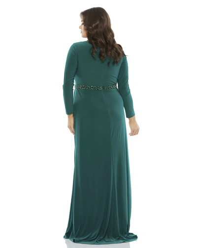 Shop Mac Duggal Beaded Belt Jersey Faux Wrap Long Sleeve Gown In Emerald