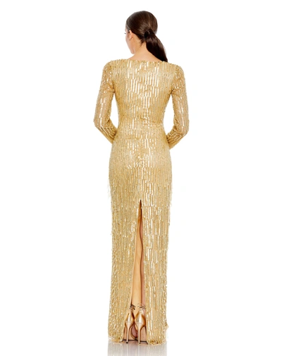 Shop Mac Duggal Sequined Long Sleeve V Neck Beaded Fringe Gown - Final Sale In Gold