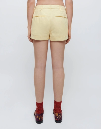 Shop Re/done 90s Trouser Shorts In Washed Buttercream