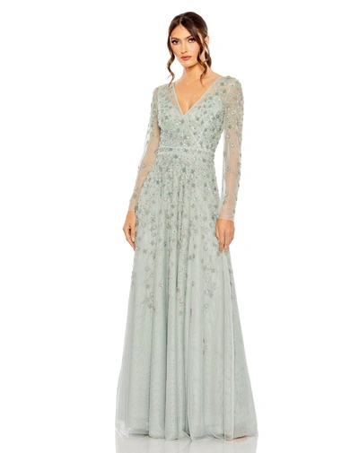 Shop Mac Duggal Embellished Wrap Over Illusion Long Sleeve A Line Gown In Sage