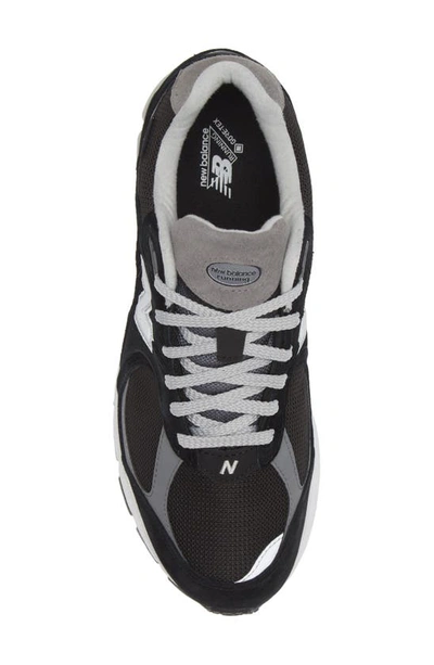 Shop New Balance 2002r Sneaker In Black/ Castlerock