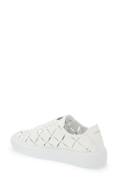 Shop Versace La Greca Cutout Stud Low Top Sneaker In White