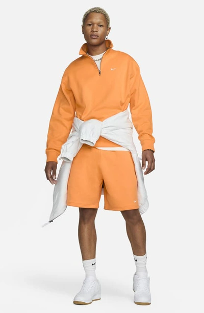 Shop Nike Solo Swoosh Oversize Quarter Zip Sweatshirt In Vivid Orange/ White