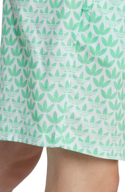 Shop Adidas Originals Graphics Monogram Woven Cotton Shorts In Easy Green