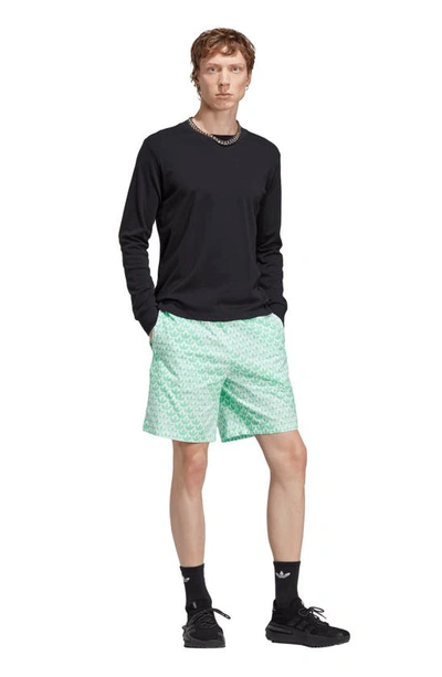 Shop Adidas Originals Graphics Monogram Woven Cotton Shorts In Easy Green