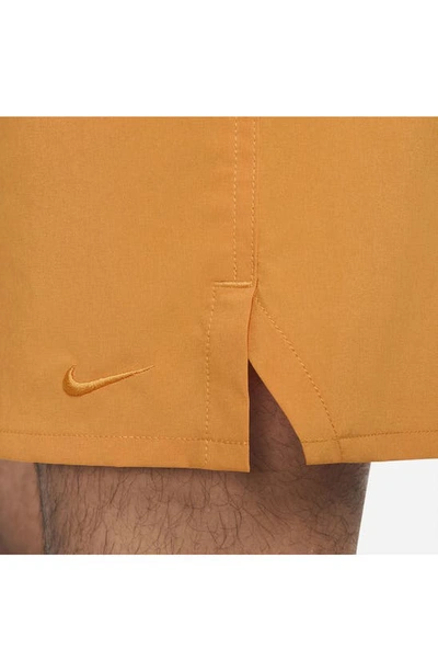 Shop Nike Dri-fit Unlimited 7-inch Unlined Athletic Shorts In Monarch/ Black