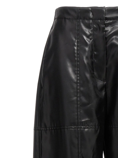 Shop Jil Sander Coated Pants In Black