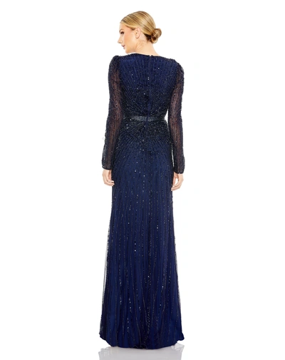 Shop Mac Duggal Sequined Wrap Over Long Sleeve Gown In Midnight