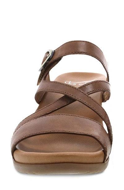 Shop Dansko Ana Asymmetric Strappy Wedge Sandal In Tan Glazed Calf