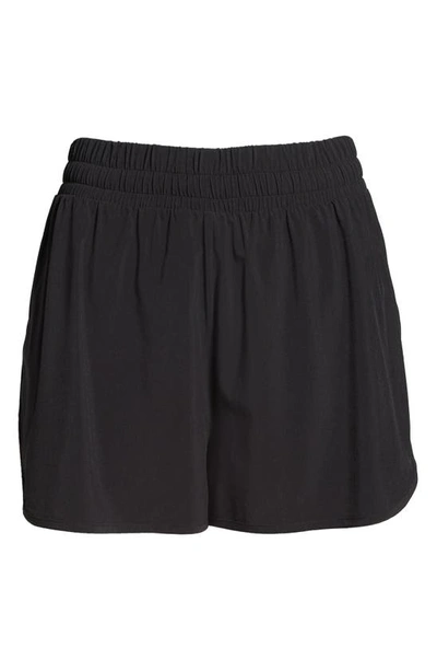 Shop Beyond Yoga In Stride Lined Shorts In True Black