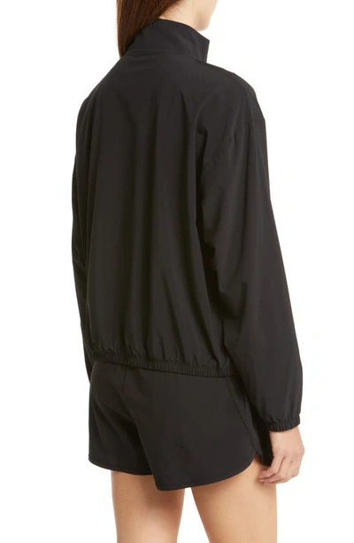 Shop Beyond Yoga In Stride Half Zip Pullover In True Black