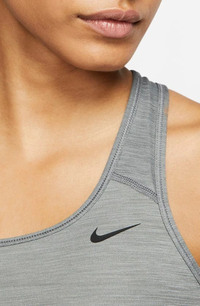 Shop Nike Swoosh Dri-fit Racerback Sports Bra In Smoke Grey/ Pure/ Black