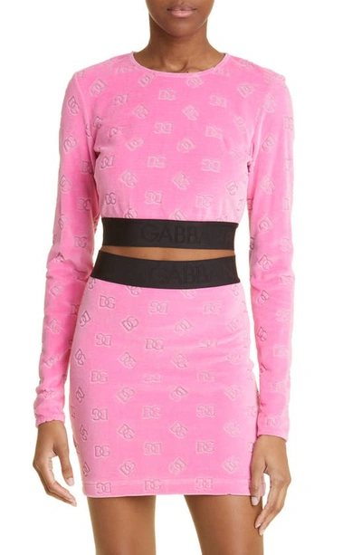 Shop Dolce & Gabbana Flocked Dg Monogram Long Sleeve Jersey Crop Top In Pink