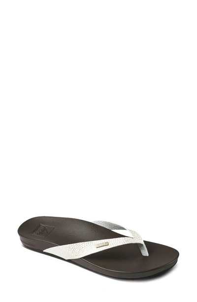 Shop Reef Cushion Bounce Court Flip Flop In Brown Sassy