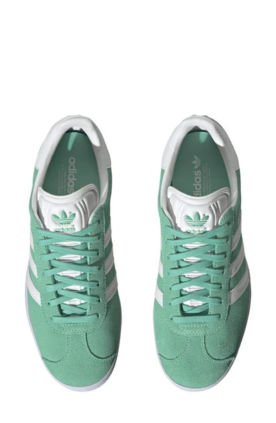 Shop Adidas Originals Gazelle Sneaker In Mint/ White/ Gold Metallic