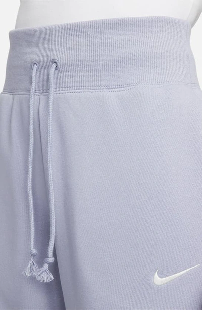 Shop Nike Sportswear Phoenix High Waist Fleece Sweatpants In Indigo Haze/ Sail