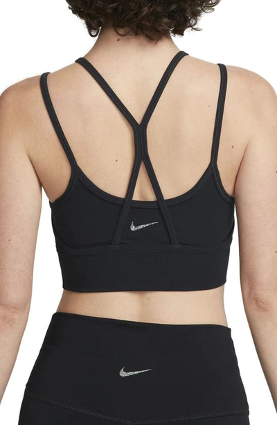 Shop Nike Dri-fit Indy Padded Strappy Light Support Sports Bra In Black/ White