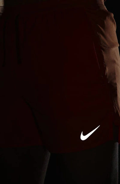 Shop Nike Dri-fit Stride 5-inch Running Shorts In Bright Mandarin/dark Russet