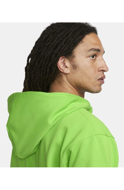 Shop Nike Dri-fit Standard Issue Hoodie Sweatshirt In Action Green/ Pale Ivory