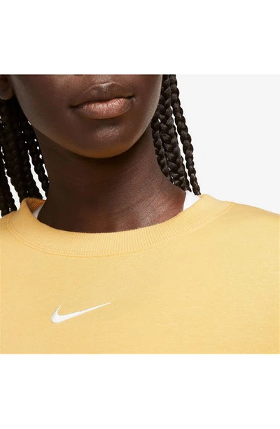 Shop Nike Phoenix Fleece Crewneck Sweatshirt In Topaz Gold/ Sail