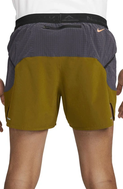 Shop Nike Second Sunrise 5-inch Brief Lined Trail Running Shorts In Olive/ Gridiron/ Mandarin