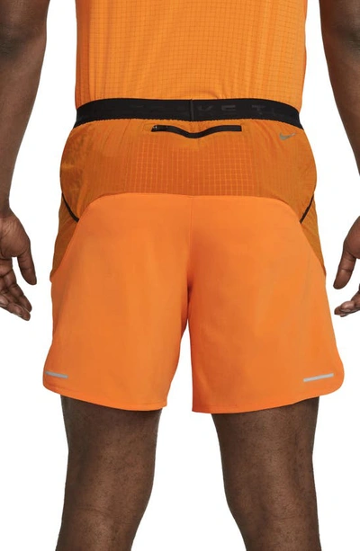 Shop Nike Dri-fit Trail Running Shorts In Bright Mandarin/ Olive