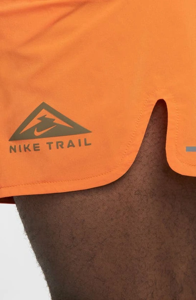 Shop Nike Dri-fit Trail Running Shorts In Bright Mandarin/ Olive