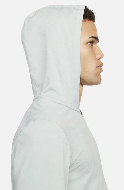 Shop Nike Yoga Dri-fit Zip-up Hoodie In Light Silver/ Mica Green