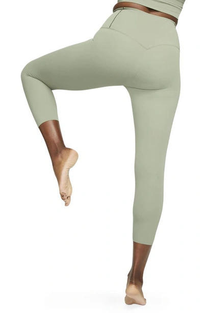 Shop Nike Zenvy Gentle Support High Waist Crop Leggings In Oil Green/ Black