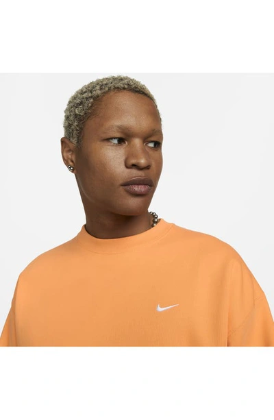Shop Nike Solo Swoosh Oversize Crewneck Sweatshirt In Vivid Orange/ White