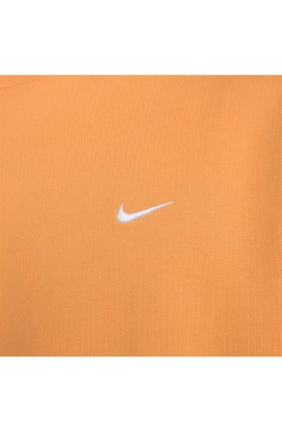 Shop Nike Solo Swoosh Oversize Crewneck Sweatshirt In Vivid Orange/ White