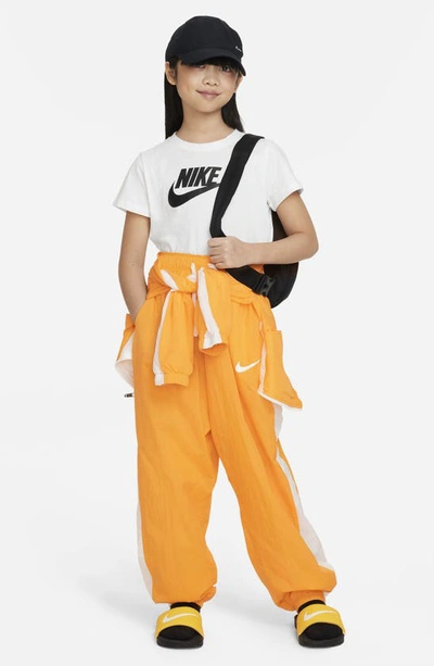 Shop Nike Kids' Sportswear Side Stripe Track Pants In Vivid Orange/ White/ White